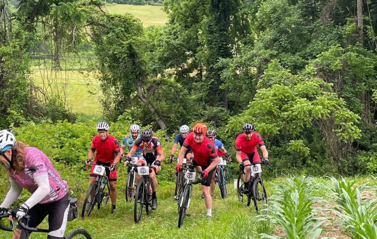GGC riders struggle up a hill